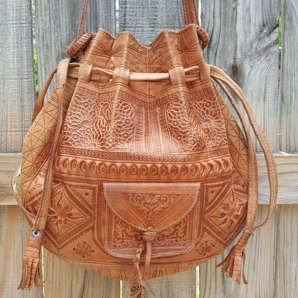 AUTHENTIC VINTAGE Handbags - VINTAGE 70s HUGE MOROCCAN HANDTOOLED WEEKENDER BAG